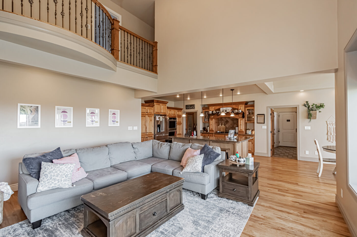 Living room with oversized windows and field views